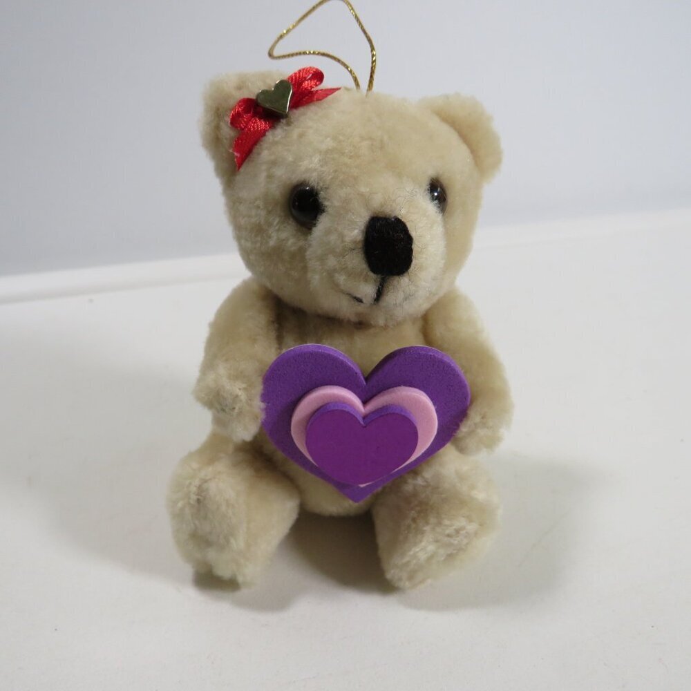 Small Vintage tan Teddy Bear with moveable joints with ear bow 1980s
